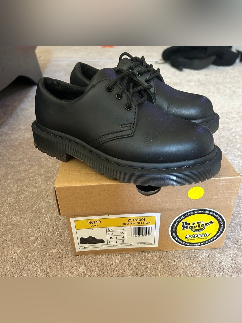 Dr. Martens women’s Black Leather Lace-Up Oxfords